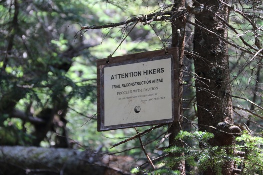Sign about 3/4 mile from the summit